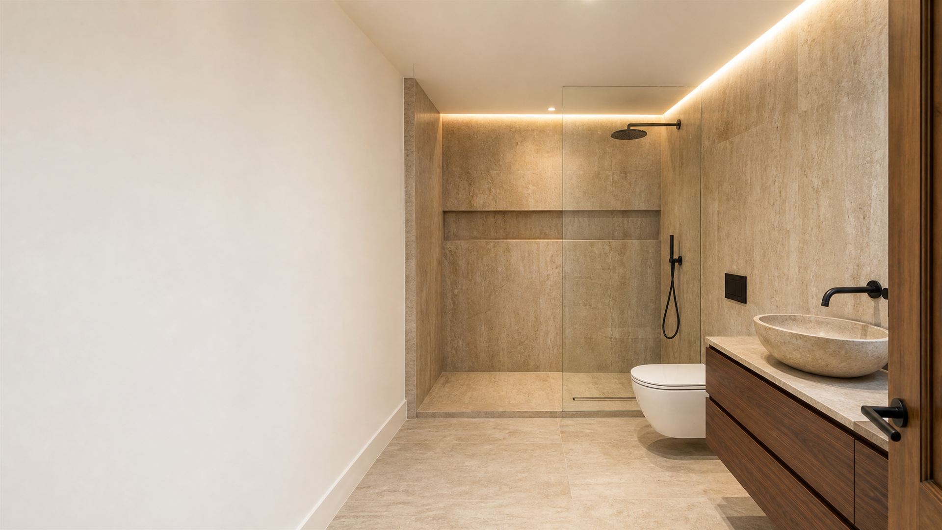 Travertine walk-in shower with walnut vanity